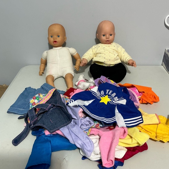 Other - 2 Adorable Baby Dolls with a bag full of Colorful clothes